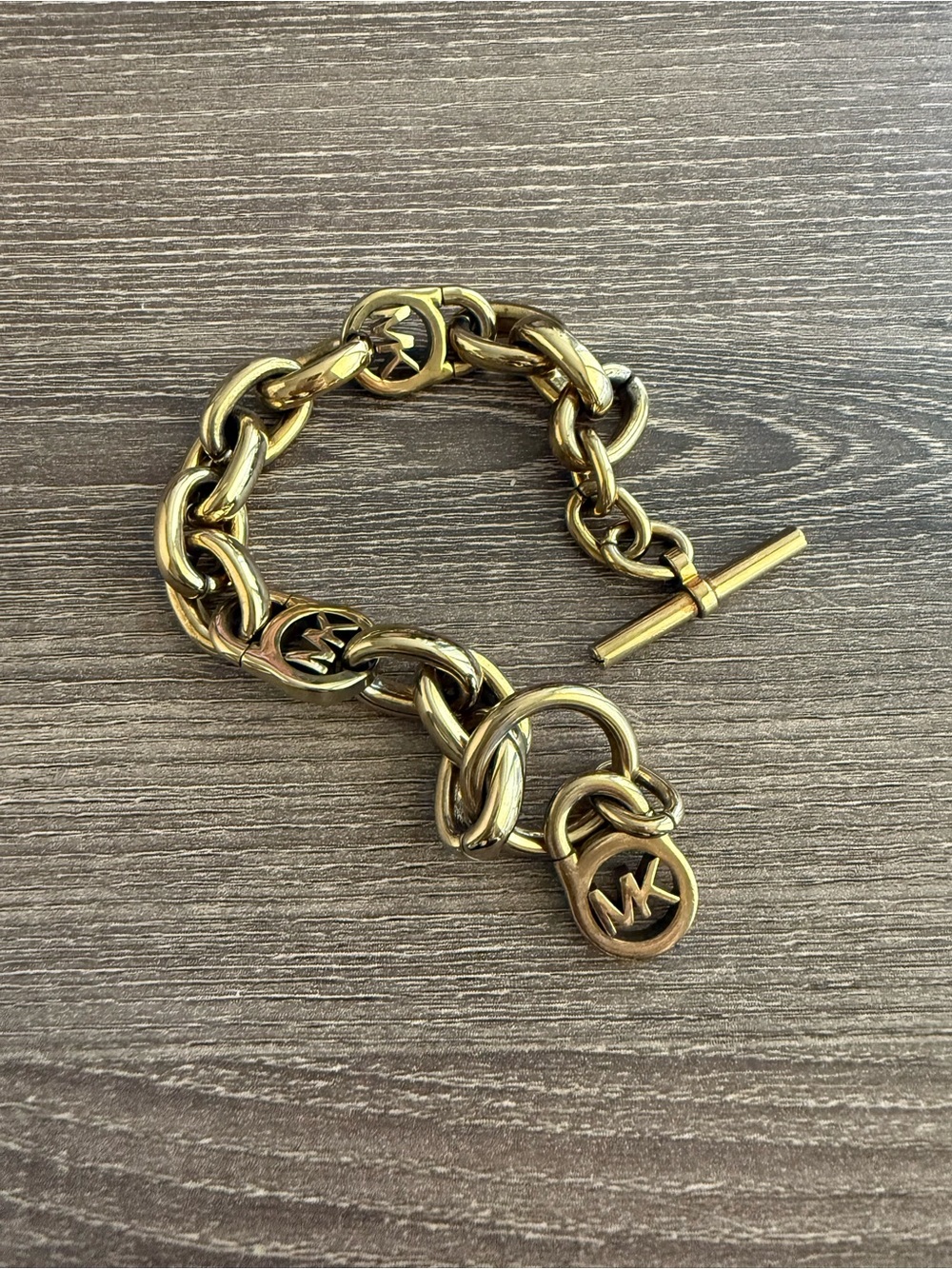 Michael Kors Brushed Gold Link Bracelet with MK Charm